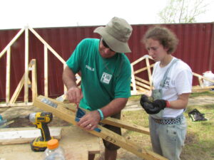 Volunteers building.