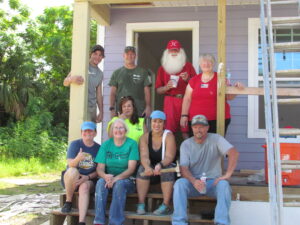 Group posing with Santa Claus.